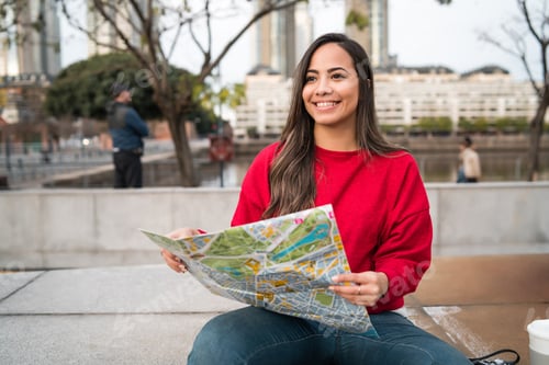 Preview: Young Latin Woman With A Map.