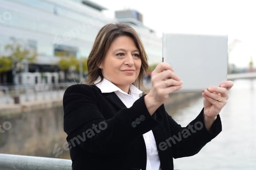Preview: Portrait Of Beautiful Business Woman Taking Selfie With Her Tablet. Outdoors.