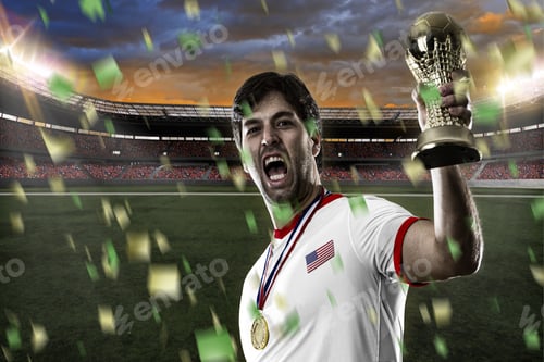 Preview: American Soccer Player, Celebrating The Championship With A Trophy In His Hand. On A Stadium.