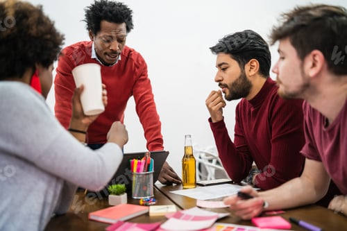 Preview: Manager Leading A Brainstorming Meeting With A Group Of Creative Designers In The Office. Leader
