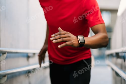 Preview: Athletic Man Running And Doing Exercise Outdoors.