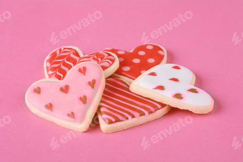 Preview: Close Up Of Heap Of Valentine'S Day Cookies. Pink Background
