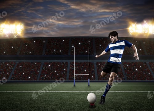 Preview: Rugby Player In A Blue Uniform Kicking A Ball On A Stadium.