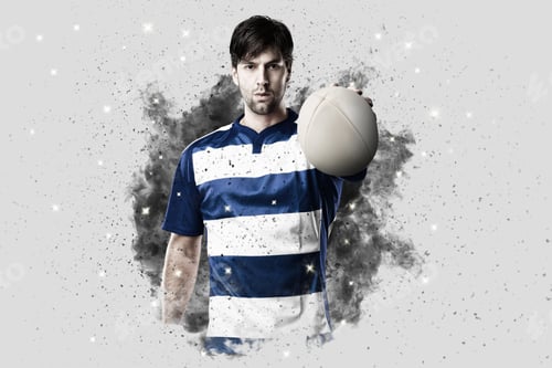 Preview: Rugby Player With A Blue Uniform Coming Out Of A Blast Of Smoke .