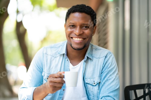 Preview: Man Drinking Coffee At Coffee Shop.