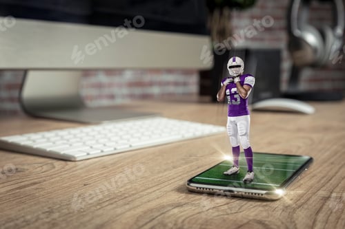 Preview: Football Player With A Purple Uniform Playing And Coming Out Of A Full Screen Phone On A Wooden