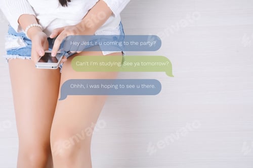 Preview: Beautiful Young Woman Using Her Smartphone And Relaxed. Indoors.