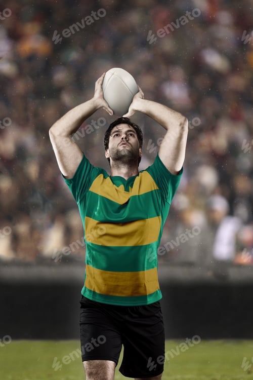 Preview: Rugby Player In A Green And Gold Uniform On A Stadium.