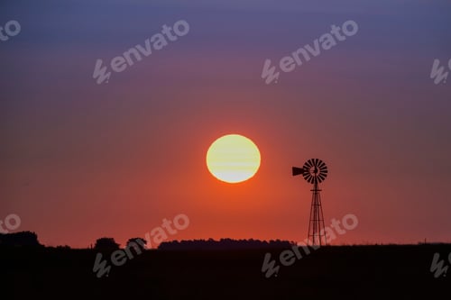 Preview: Windmill In Countryside At Sunset, Pampas, Patagonia,Argentina.
