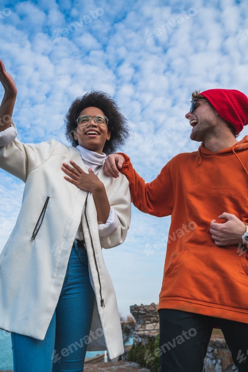 Preview: Portrait Of Two Young Friends Spending Good Time Together And Having Fun With The Sea In The
