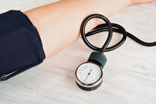Preview: Close Up View Of Person Measuring His Blood Pressure. Medicine Concept