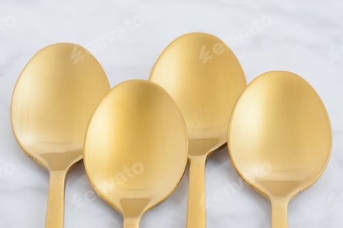 Preview: Golden Spoon Set Styled On Antique Carrara Marble