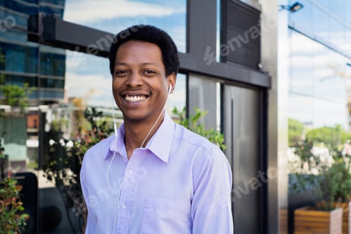 Preview: Portrait Of Young Afro American Businessman In The City.