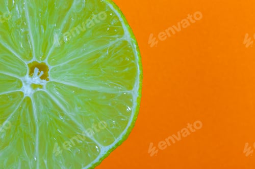 Preview: Fresh Lemon Isolated On Orange Background, Top View, Concept Photo.