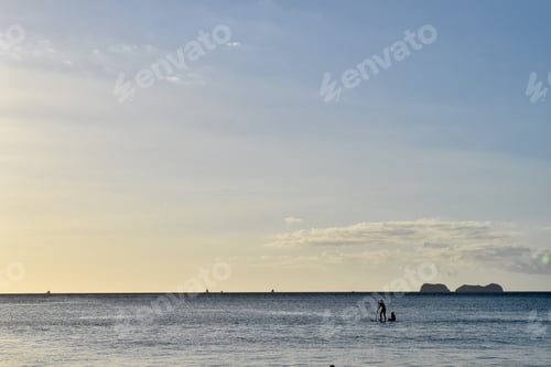 Preview: Kids Silhouette Playing In The Beach With A Paddle Board