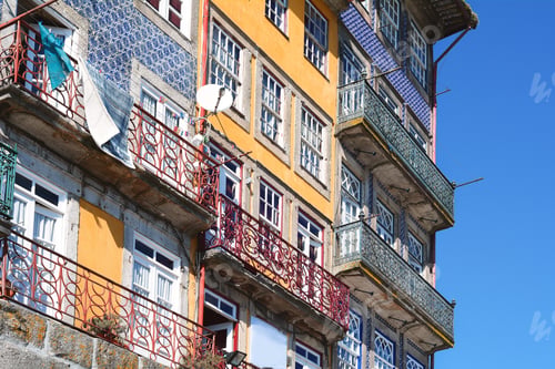 Preview: Old High Living Houses With Sky At The Background.