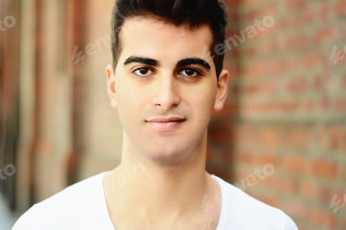 Preview: Portrait Of A Young Asian Man. Outdoors. Urban Concept.