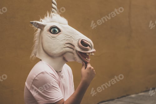 Preview: Photograph Of A Teen With A Funny Unicorn Mask