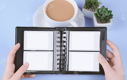 Preview: Photo Album With Blank Instant Photos On Light Blue Background. Travel Concept