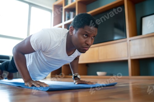 Preview: Man Doing Exercise At Home.