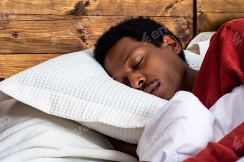 Preview: Close-Up Afro American Man Sleeping In Bed