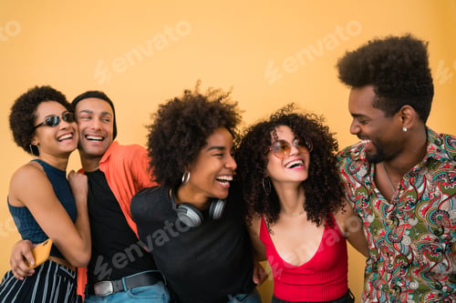 Preview: Portrait Of Afro Friends Having Fun Together And Enjoying Good Time Against Yellow Background
