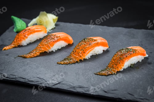 Preview: Perfect Sushi, Traditional Japanese Cuisine. Delicious Salmon Kiguiri On The Decorated Plate, Black