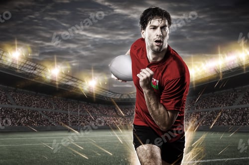 Preview: Welsh Rugby Player, Wearing A Red Uniform In A Stadium.