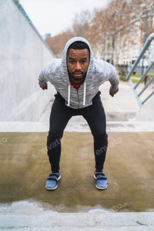 Preview: Portrait Of An Athletic Man Doing Some Exercise Outdoors. Sport, Fitness And Healthy Lifestyle.