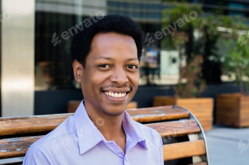 Preview: Portrait Of Young Afro American Businessman In The City.