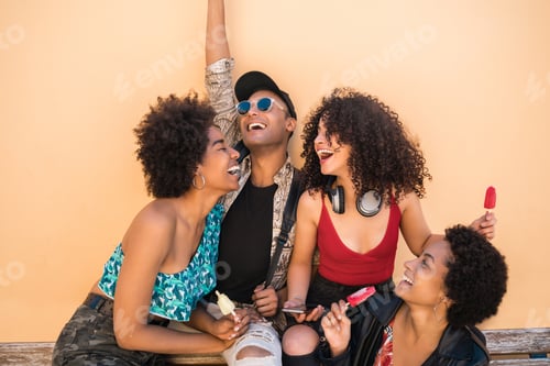 Preview: Portrait Of Multi-Ethnic Group Of Friends Having Fun And Enjoying Summertime While Eating Ice Cream