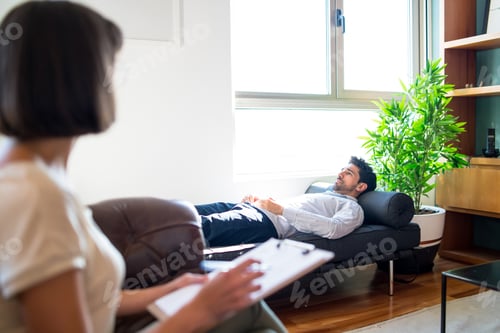 Preview: Psychologist Talking With Patient On Therapy Session.