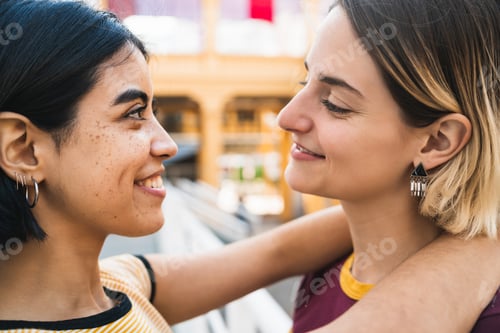 Preview: Portrait Of Happy Lesbian Couple Spending Time Together And Hugging At The Street. Lgbt Concept.