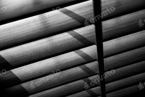Preview: A Grayscale Shot Of Window Blinds Under The Sunlight With Blurred Edges