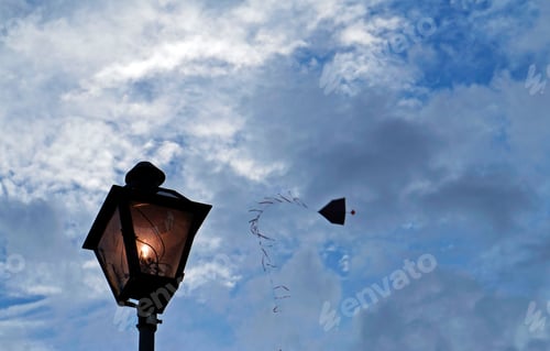 Preview: Light Pole And Kite Silhouette In Sky, Sao Joao Del Rei, Minas Gerais, Brazil