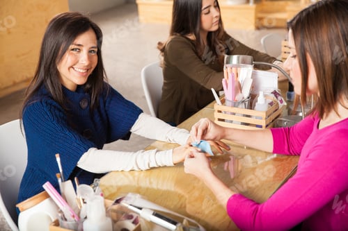 Preview: Women at Nail Salon Getting Manicures and Pedicures