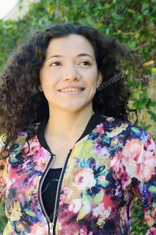 Preview: Portrait Of Beautiful Young Latin Woman In The Park.