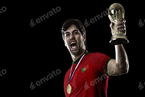 Preview: Portuguese Soccer Player, Celebrating The Championship With A Trophy In His Hand. On A Black