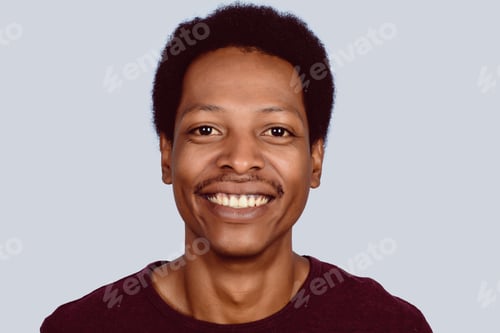 Preview: Portrait Of Afro American Man Looking At Camera On Studio.
