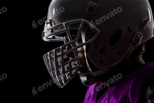 Preview: Close Up Of A Football Player With A Pink Uniform On A Black Background.