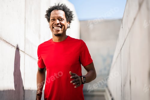 Preview: Athletic Man Running And Doing Exercise Outdoors.
