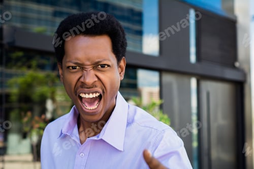 Preview: Professional Young Businessman Angry Shouting To Someone Outside Office Building.