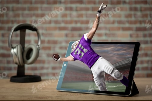 Preview: Football Player With A Purple Uniform Playing And Coming Out Of A Tablet. Watching A Football Game