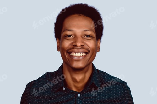 Preview: Portrait Of Afro American Man Looking At Camera On Studio.