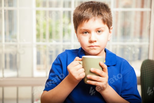 Preview: White Tween Drinking Some Coffee From A Mug At Home