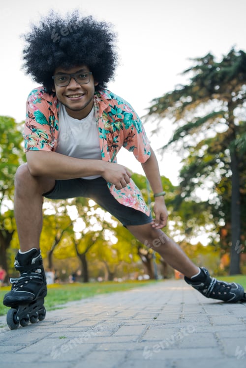 Preview: Afro Latin Man Rollerskating Outdoors.