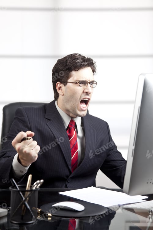 Preview: Happy Businessman In Front Of The Computer.