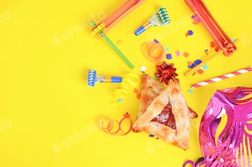 Preview: Top View Of Purim Background With Carnival Mask, Party Costume And Hamantaschen Cookies. Purim