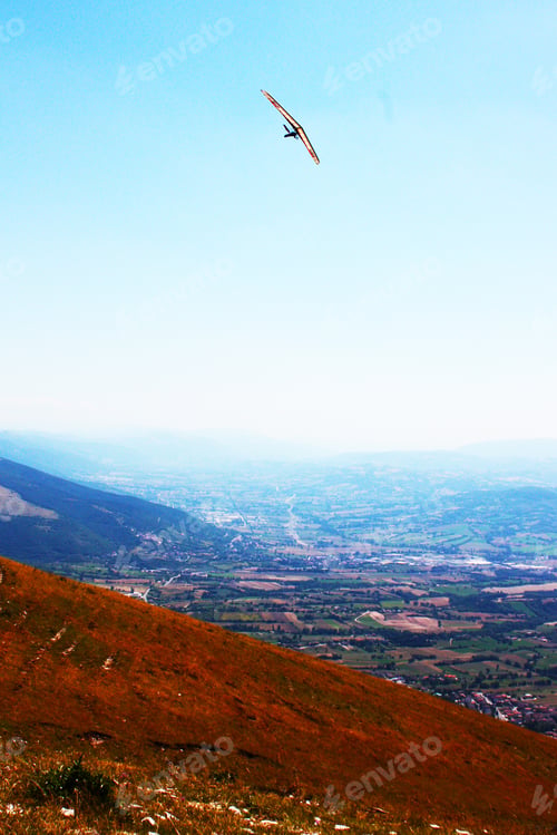 Preview: Hang Glider Pilot In Italian Mountains
