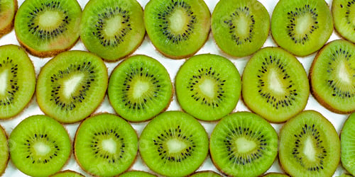 Preview: Fresh Green Sliced Kiwi Background - Healthy Food